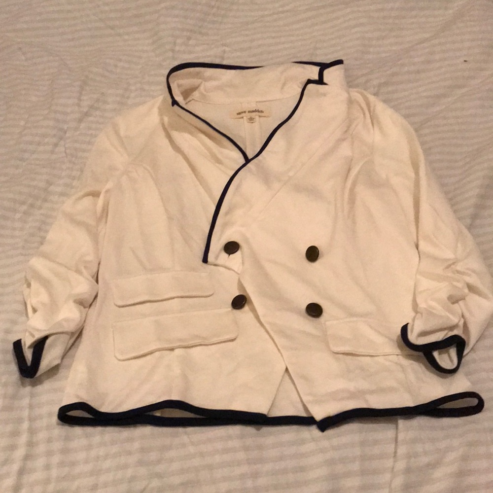 A three quarter ruched up knit blazer.